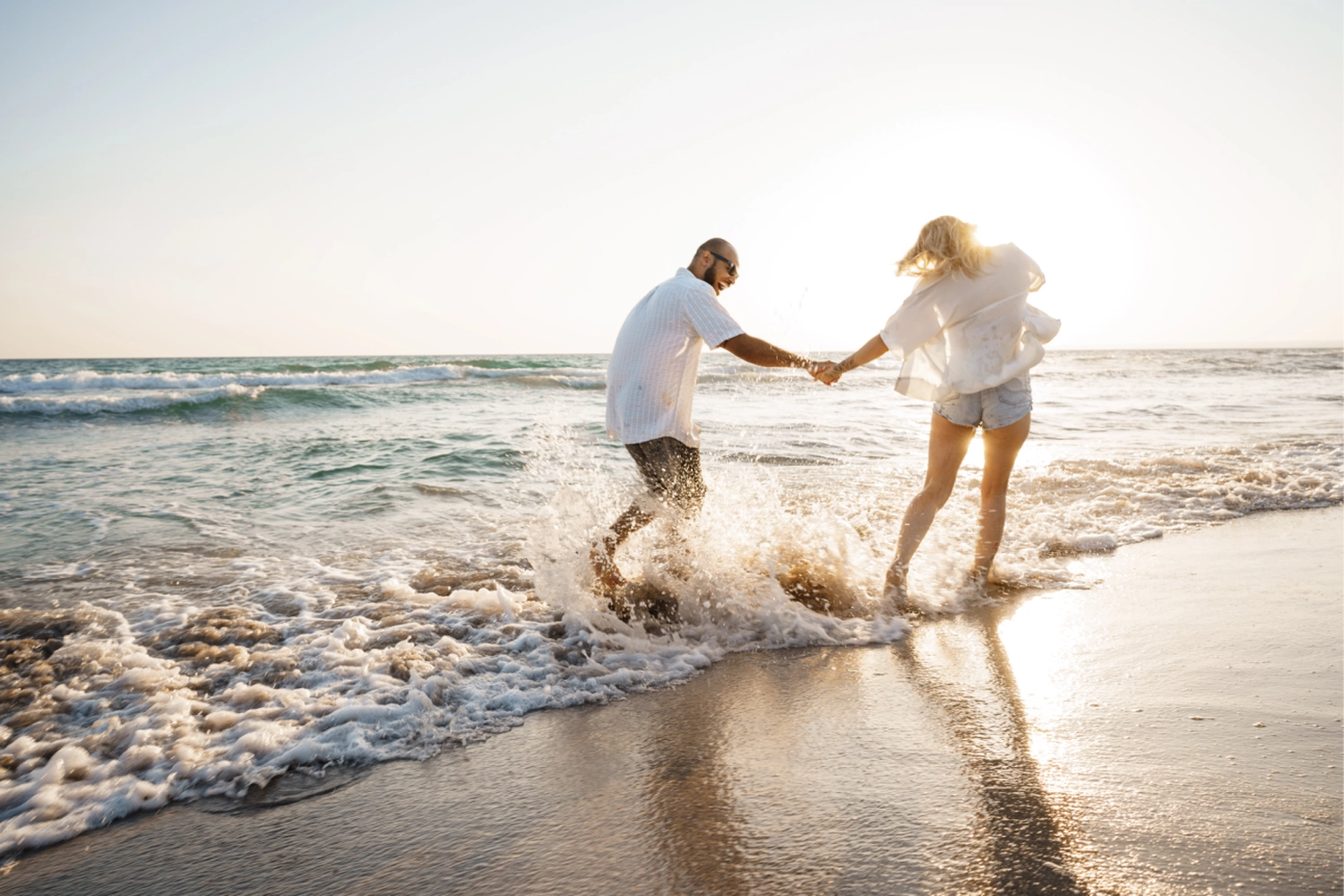 IK - Consulting und Coaching - Paar beim Genießen am Strand